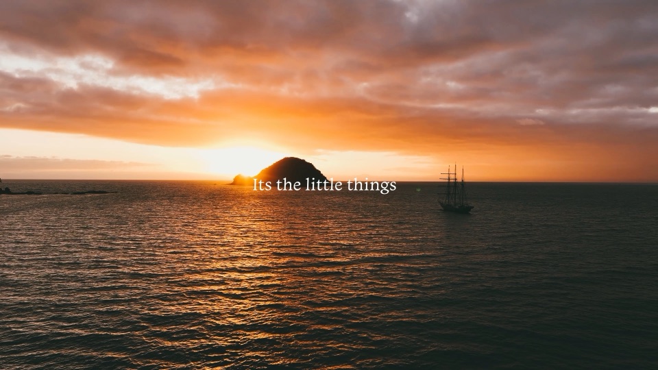 Sunset over the water with the Spirit of New Zealand at anchor, a still from the SOAT social media video